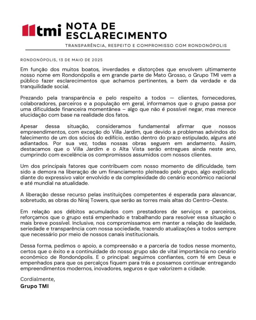 Dificuldade financeira: Grupo TMI emite nota de esclarecimento à sociedade mato-grossense 4 Documento da nota de esclarecimento do Grupo TMI em Rondonópolis, destacado sobre uma mesa com o logotipo da empresa, simbolizando transparência.