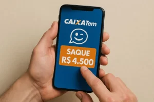 celular mostrando o aplicativo Caixa Tem na tela com destaque em “Saque R$ 4.500”